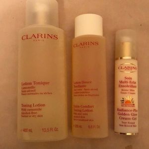 3 piece Clarins Lot toners And self tanner face